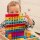 Set of 100 colored and transparent acrylic cubes and a wooden mirror box