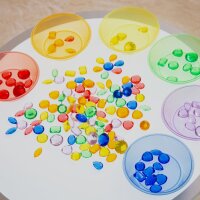 Set with 144 colorful, translucent plastic gems in a storage box
