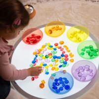 Set with 144 colorful, translucent plastic gems in a storage box